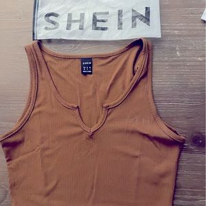 Cotton blend, XS, never been worn. Can ship right away.